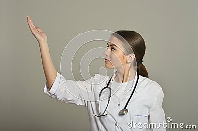 Female doctor shows Stock Photo