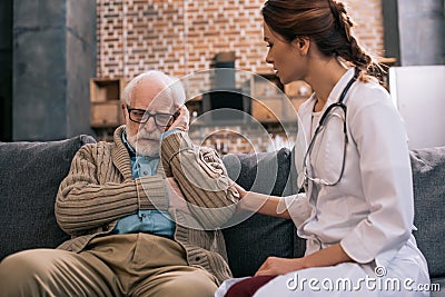 Female doctor supporting sad Stock Photo