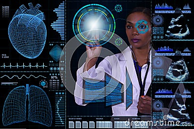 A female doctor is visible behind a futuristic computer floating in front of her. Stock Photo