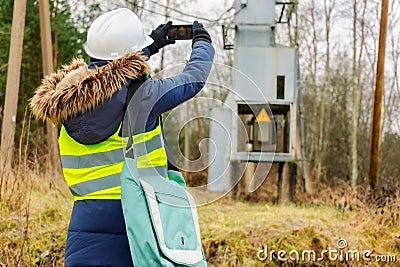 Female electrical engineer take pictures Stock Photo