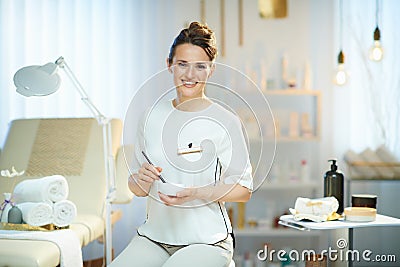 Female employee in modern beauty salon working Stock Photo