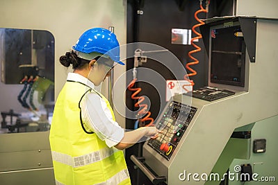 Female engineer command factory automate machine Stock Photo
