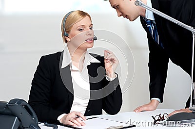 Female executive discussing business issue Stock Photo