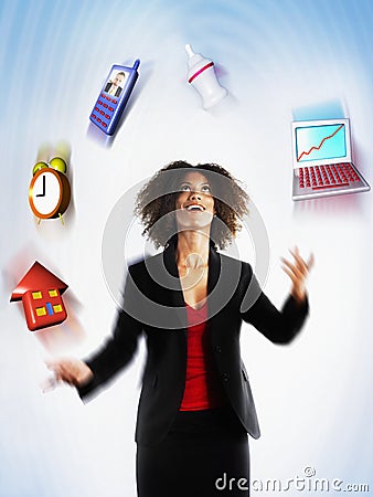 Female Executive Juggling Responsibilities Stock Photo