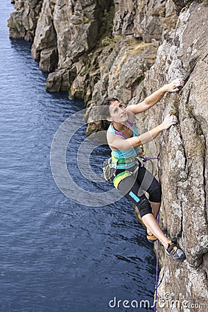 Female extreme climber Stock Photo