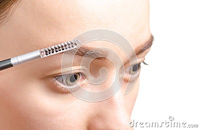 Female eyebrow shape brown eyebrow brush Stock Photo