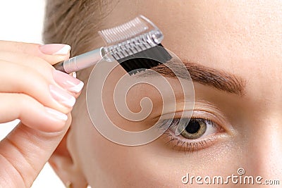 Female eyebrow shape brown eyebrow brush Stock Photo