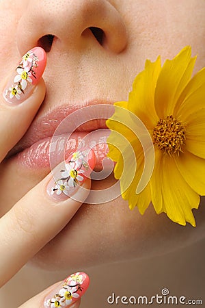 Female face close and nail art Stock Photo