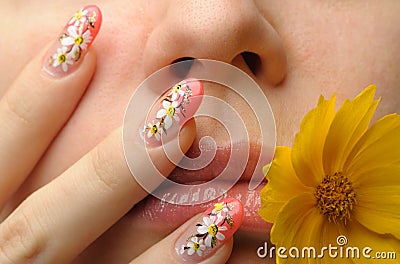 Female face close and nail art Stock Photo