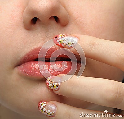 Female face close up and nail art Stock Photo