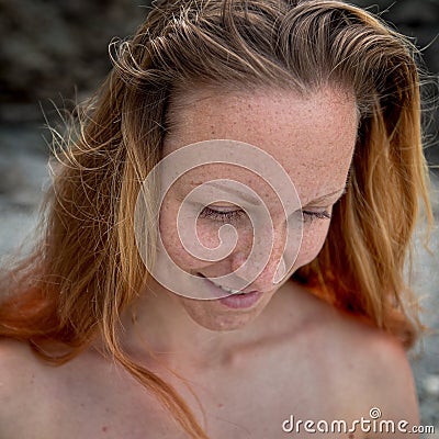 Female face with freckles Stock Photo