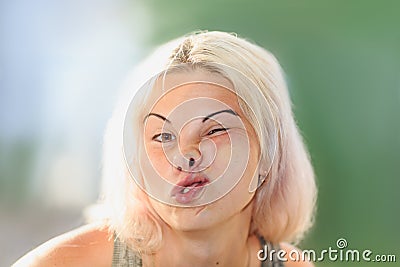 Female face pressed against glass or window Stock Photo