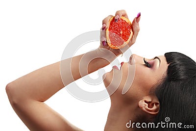 Female face with pummelo Stock Photo