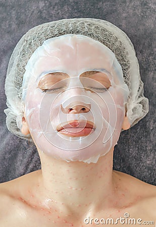 Female face. Woman with a hydrogel mask Stock Photo