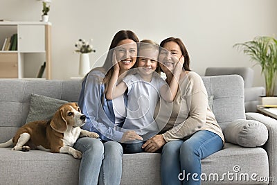 Female family portrait with adorable beagle dog Stock Photo