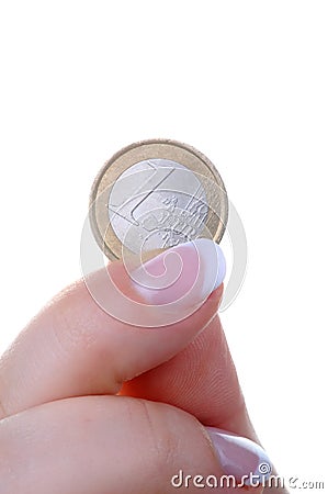 Female finger with one euro coin Stock Photo