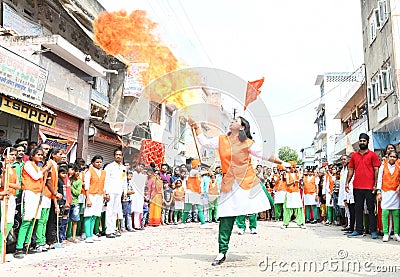 A female flamethrower performs a stunt in Beawar, India Editorial Stock Photo