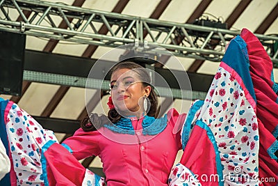 Female folk dancer performing a typical dance Editorial Stock Photo