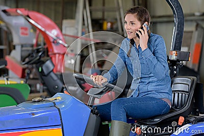 female garden tractor mechanic Stock Photo