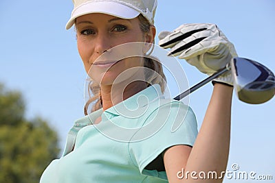Female golf player Stock Photo