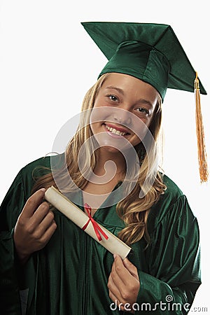 Female graduate in cap and gown Stock Photo