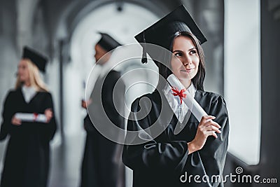 Female graduate in university Stock Photo