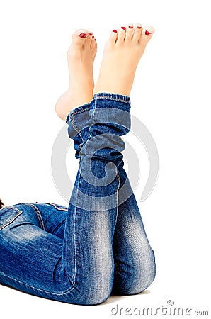 Female groomed legs in jeans Stock Photo