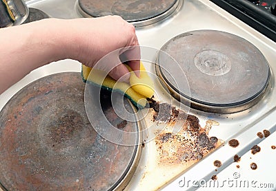 Cleaning Dirty Stove Stock Photo