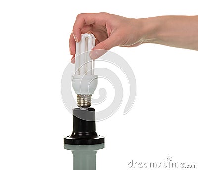 In female hand compact fluorescent light bulb, the cartridge is Stock Photo