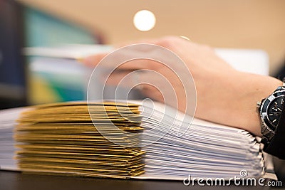 Female hand with files or dossiers Stock Photo