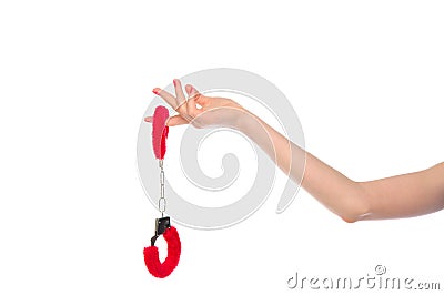 Female hand with handcuffs for sex games Stock Photo