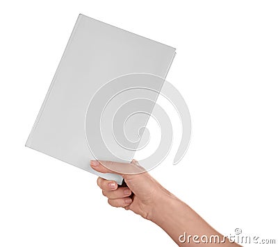 Female hand holding book with blank cover on white background Stock Photo