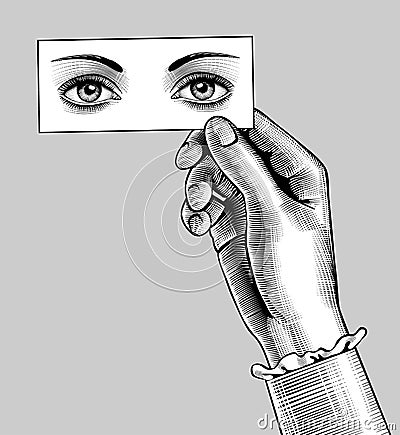 Female hand holding a card with eyes drawing Vector Illustration