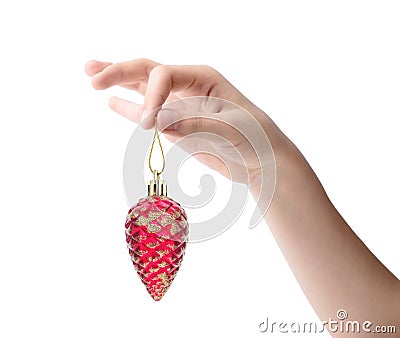 Female hand holding a Christmas toy isolated on white background Stock Photo