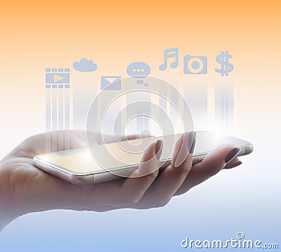 Female hand holding a phone. Drawn icons of messages, music, payment and camera Stock Photo