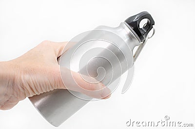 Female hand holding a reusable water bottle Stock Photo