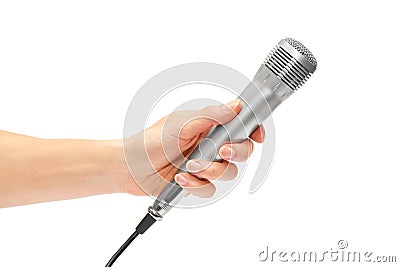 Female hand holding a stereo microphone to record a song or karaoke Stock Photo