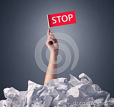 Female hand holding stop sign Stock Photo