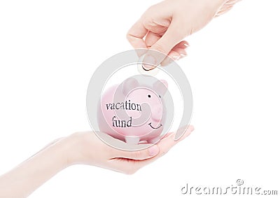 Female hand holds piggy bank vacation fund concept Stock Photo