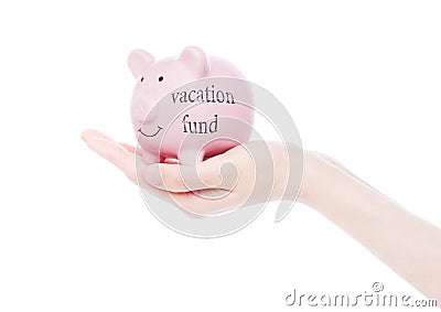Female hand holds piggy bank vacation fund concept Stock Photo