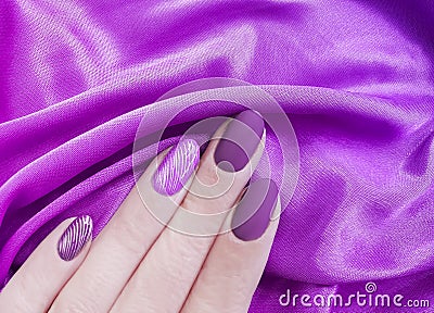 Female hand manicure, silk fabric bright aesthetics, stylish, elegance Stock Photo