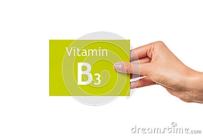 Female hand shows a card with the inscription Vitamin B3. Vitamin B3. Stock Photo