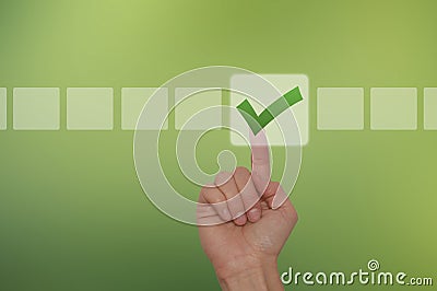 Female Hand Touching Button and Ticking Check Box Stock Photo