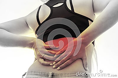 Female hands on back closeup, pain concept Stock Photo