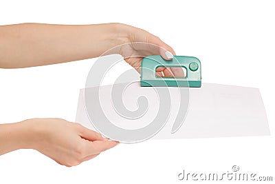 Female hands clerical punch Stock Photo