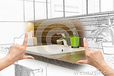 Female hands framing custom bathroom design. Stock Photo