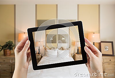 Female Hands Holding Computer Tablet In Room with Photo on Screen Editorial Stock Photo