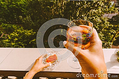 female hands holding a glass of wine Stock Photo