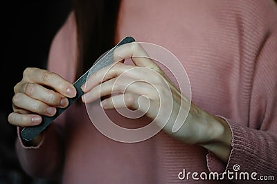 Female hands with nailfile. Manicure concept Stock Photo