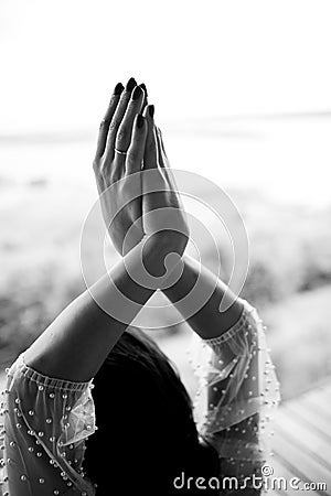 Interlacing hands. female hands on nature background Stock Photo